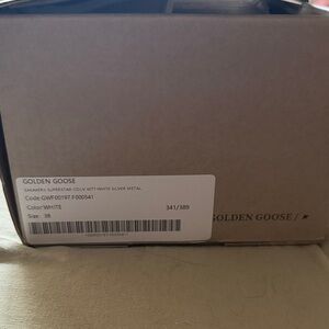 Golden Goose White and Silver Sneakers